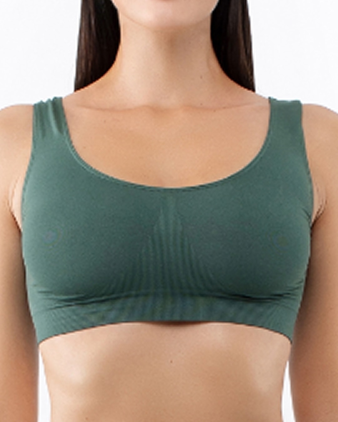 Green sports bra on a model.