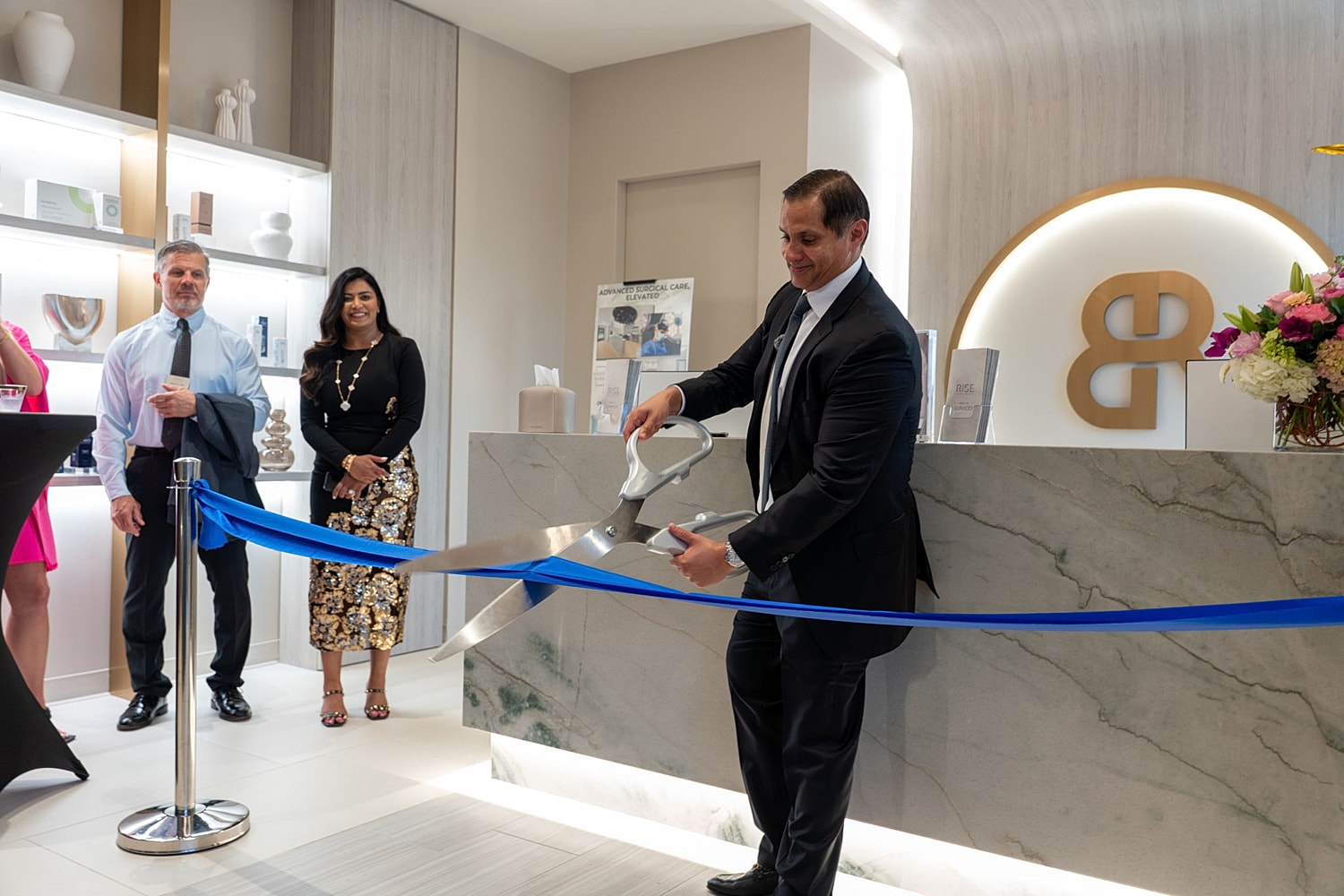 Ribbon-cutting ceremony at a new business opening.