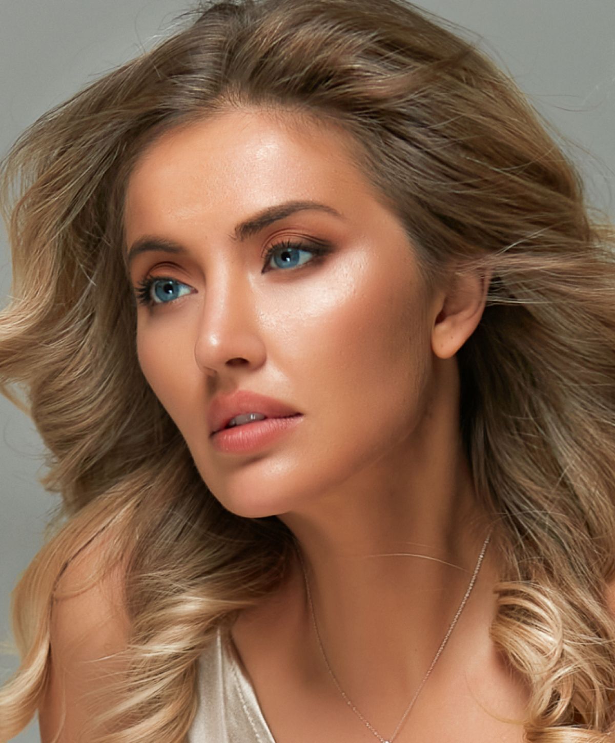 Houston Medical Spa model with blue eyes