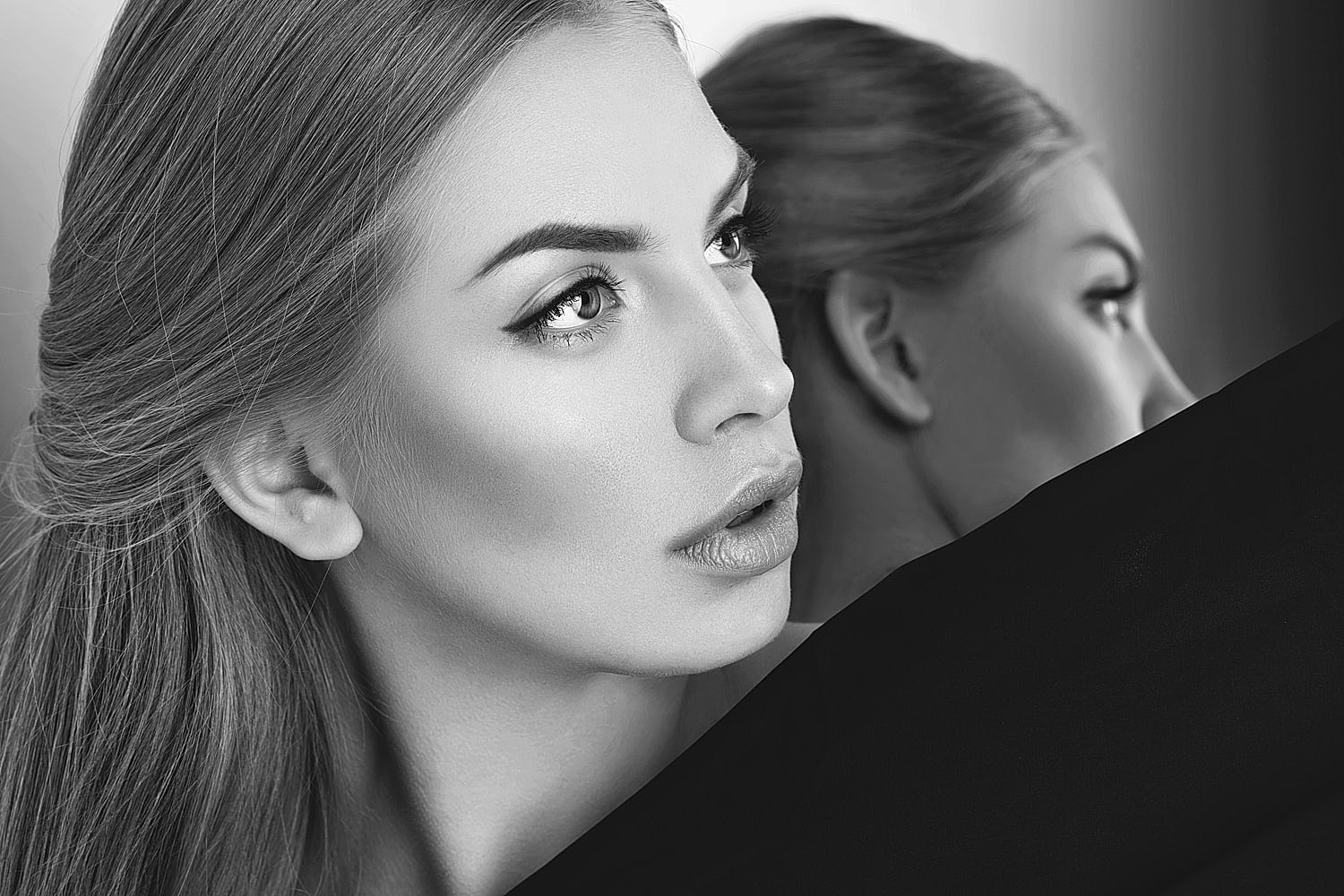 Black and white portrait of a woman.