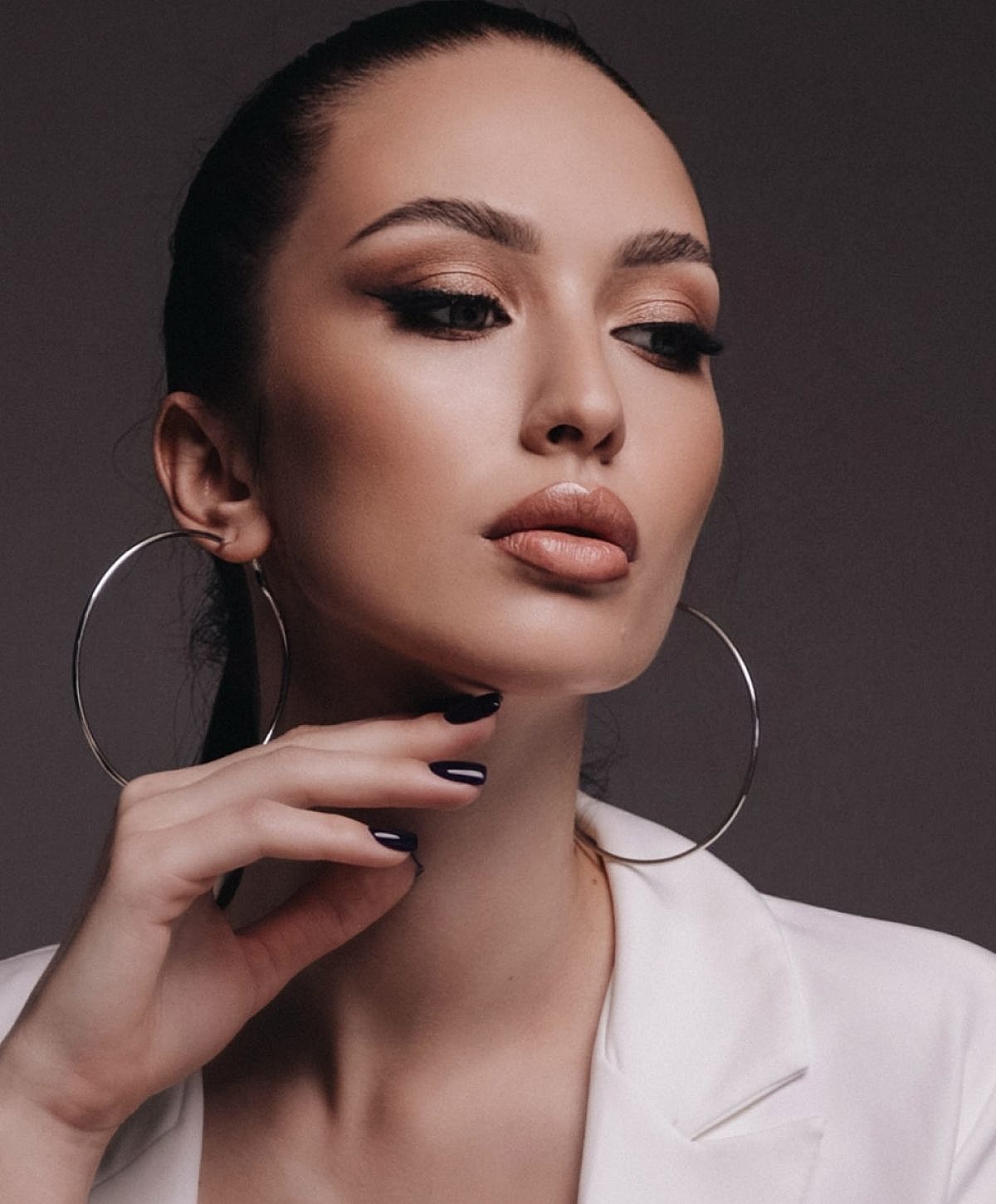 Houston Sculptra model with brown eyes