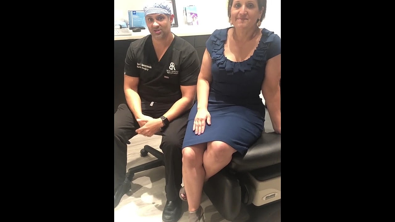 Patient consultation in a medical office setting.